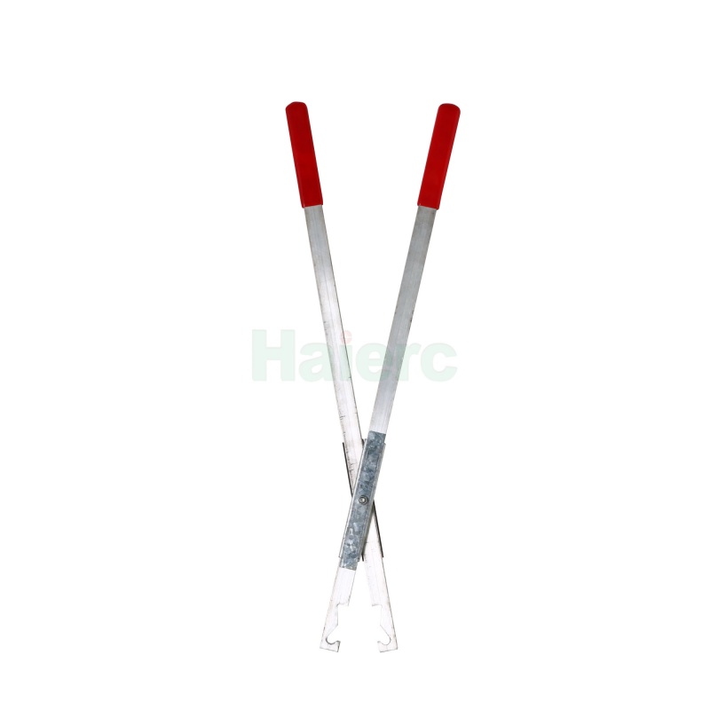 Công cụ phụ trợ thiết lập bẫy chân lò xo X HC2715, cán kim loại dài 60,5 cm với tay cầm đỏ dùng để thao tác bẫy